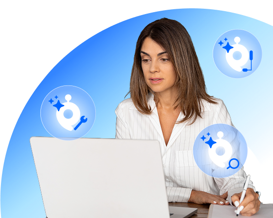 A woman with long brown hair wearing a striped blouse works at a laptop. A woman with long brown hair wearing a striped blouse works at a laptop.